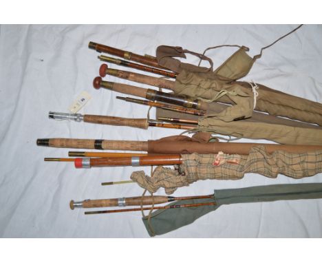 A collection of old fishing rods: "Scottie", by JS Sharpe 9ft. two-piece split cane fly rod; Martin James a 15ft. three-piece