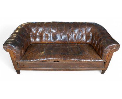 20th century A large Chesterfield sofa with brown leather tufting to the back and sides Perfect state of distress Dimensions: