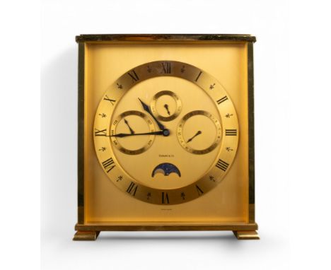 Tiffany &amp; Co Clock with day date gilt metal With Investcorp inscription to the top Together with a&nbsp;French, early 20t