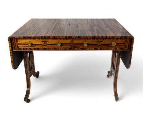 Regency A coromandel sofa table with two drawers, brass handles and casters Property of a nobleman Dimensions:&nbsp;29 in. (H