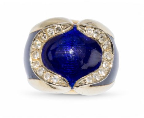 1960s  An 18 carat gold, blue enamel and diamond dress ring Stamped 750  Total weight approximately 12.33 grams Finger size: 