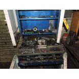 Portable workbench/cabinet, including drill bits.