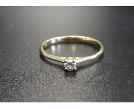 DELICATE DIAMOND SOLITAIRE RINGon fourteen carat gold shank, ring size J-K 