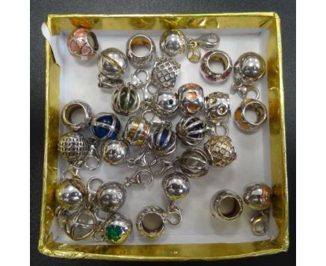 LARGE SELECTION OF SILVER BALL CHARMSof various designs including enamel decorated and cage design examples holding beads (29