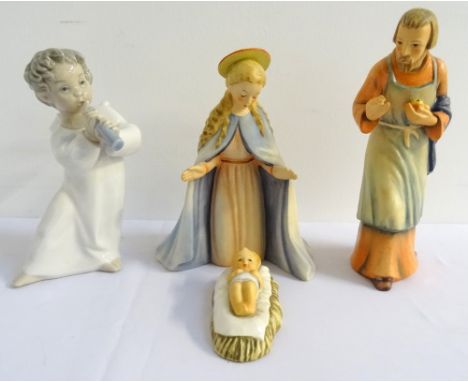 LLADRO FIGURINE OF A CHERUB PLAYING A FLUTE15.5cm high, with box; together with three Goebel figures of Mary, Joseph and the 