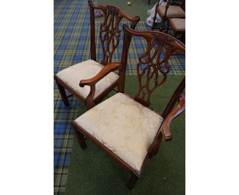SET OF SIX CHIPPENDALE STYLE MAHOGANY DINING CHAIRS with a shaped top rail above a carved and pierced splat, with drop in sea