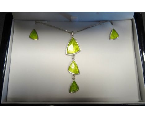 MALCOLM GRAY FOR ORTAK SILVER AND GREEN ENAMEL SUITE OF JEWELLERYcomprising a drop pendant on chain and matching pair of earr