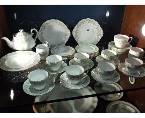 An Attractive Rosslyn China 'Whispering Grass' Part Tea Service, with cups, saucers, plates, breakfast plates, teapot, two mi