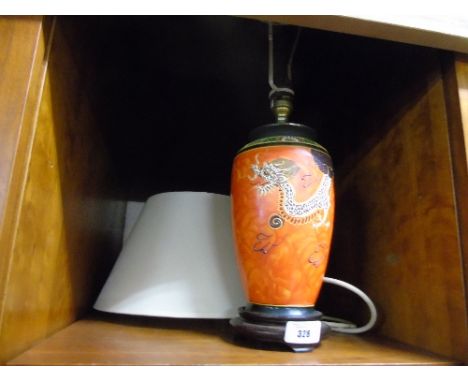 A Chinese Lamp and Shade.