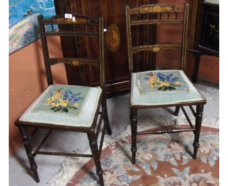 A Pair of Edwardian Mahogany and Inlaid Bedroom Chairs with tapestry panel seats.  