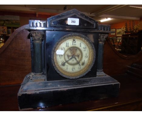 A Victorian Black Slate Mantel Clock.