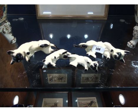 Four Ceramic Siamese Cats.