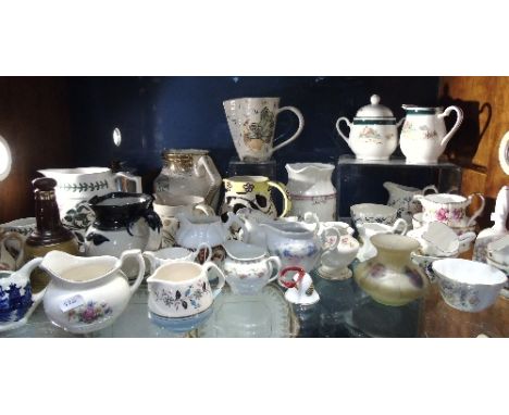 A Good Shelf of Dresser Jugs, Milks & Sugars to include Belinda Bradshaw, Laura Ashley, McCluskey Pottery, Eve Studio Pottery