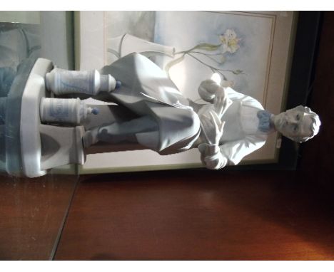 A Lladro Figure of an Apothecary. 31.5 cm.