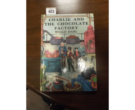 A Roald Dahl 'Charlie and the Chocolate Factory' First Edition hardback     Slight tear to spine and back cover 