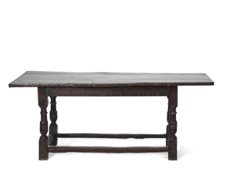 17th century and later oak refectory table, the later top raised on ring turned and balustered supports joined all round by a