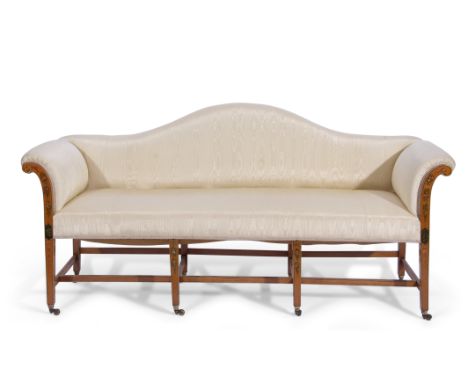 Edwardian Georgian style painted satinwood three-seated hump-back sofa on eight tapering square legs with casters, upholstere