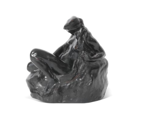 Attributed to Courtenay Pollock (1877-1943), a bronze figure of a reclining female nude on a rocky plinth base, 25cm high