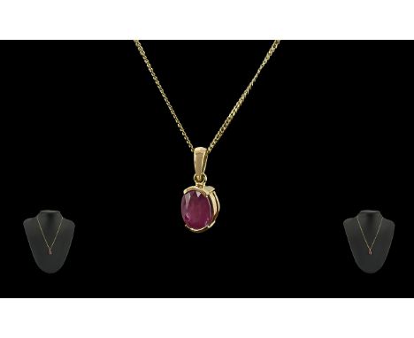 Ladies 18ct Gold Royal Ruby Set Pendant Drop Attached to a 18ct Gold Chain. Both Pendant Drop and Chain, Marked for 750 - 18c