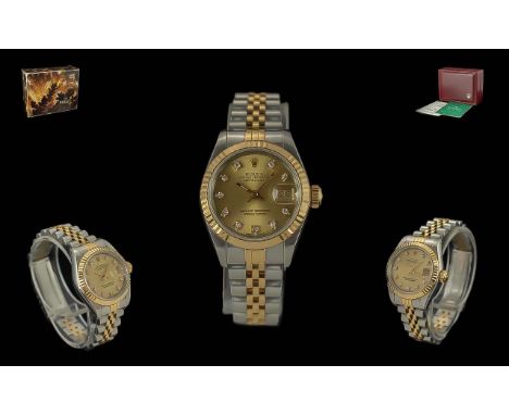 Rolex Oyster Perpetual Date-Just Chronometer Ladies 18ct Gold and Steel Wrist Watch. Features 18ct Gold Bessel, Links, Diamon
