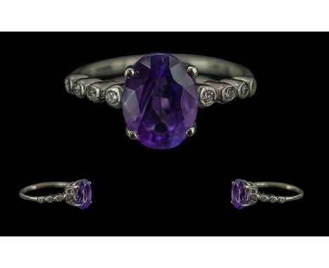 9ct Gold Amethyst &amp; Diamond Ring, weight 2.47 grams, Ring size M.