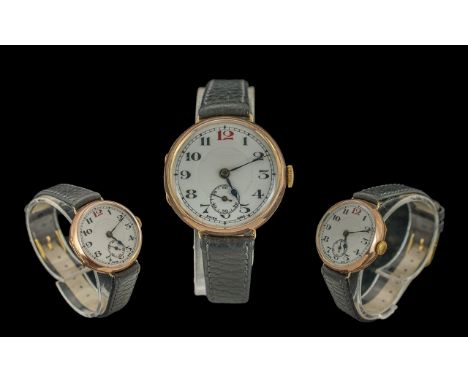 A 9ct Gold Mechanical Trench Watch with Subsidiary Dial, White Porcelain Dial. c.1920's.