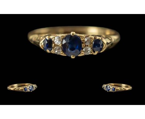 Antique Period Pleasing Ladies 18ct Gold Seven Stone Sapphire &amp; Diamond Set Ring.  Marked 18ct to interior of shank.  The