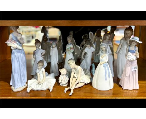 Collection of Nine Pieces of Nao and three other Spanish figures.  Mostly women, with flowers, dogs, ballerinas, etc.  Talles