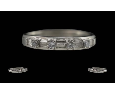 Ladies Contemporary Platinum Diamond Set Ring -Marked 950 To Shank. The Baguette And Brilliant Cut Diamonds of Excellent Colo