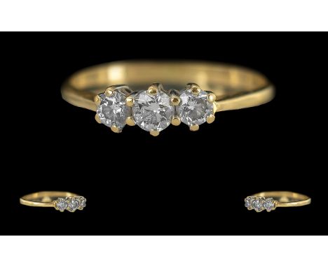 Ladies 18ct Gold 3 Stone Diamond Set Ring, Marked 18ct to Interior of Shank, The 3 Round Faceted Diamonds of Good Colour / Cl