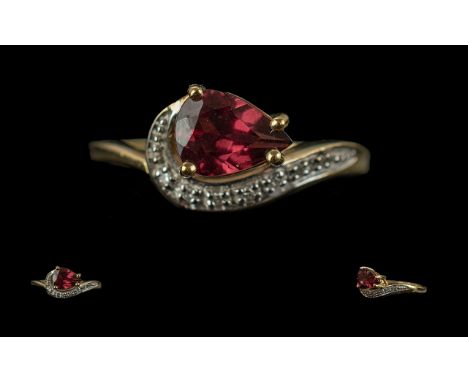 Ladies 9ct Gold &amp; Ruby Set Dress Ring. Hallmarked for 9ct. Approx Ring Size O. Approx Weight 2.3 grams.