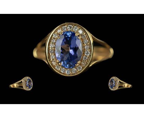 Ladies 18ct Gold Tanzanite and Diamond Set Cluster Ring, Full Hallmark to Interior of Shank, The Tanzanite of Good Colour and