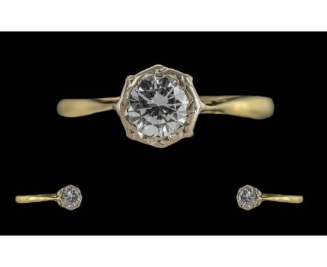 Ladies 18ct Gold Single Stone Diamond Set Ring. Marked 18ct to Interior of Shank. The Round Faceted Diamond of Good Colour / 