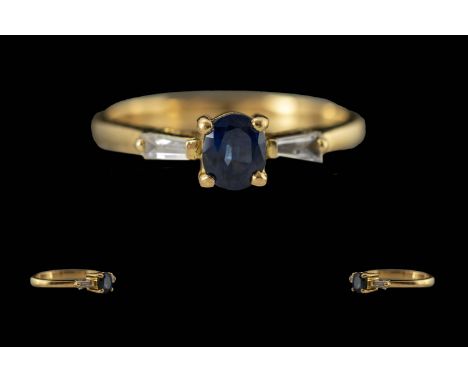 Ladies 18ct Gold Contemporary Diamond and Sapphire Dress Ring - Full Hallmark To Interior of Shank. The Central Sapphire Of G