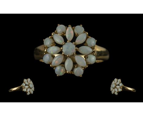 Ladies 9ct Gold &amp; Opal Set Ring. Flower head Setting. Hallmarked for 9ct Gold. Approx Ring Size O. Approx Weight 2.75 gra