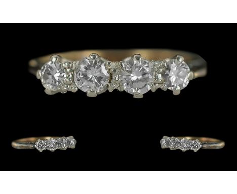 Ladies 18ct Gold Pleasing Four Stone Diamond Set Ring.  Full hallmark to interior of shank.  The well-matched diamonds of goo