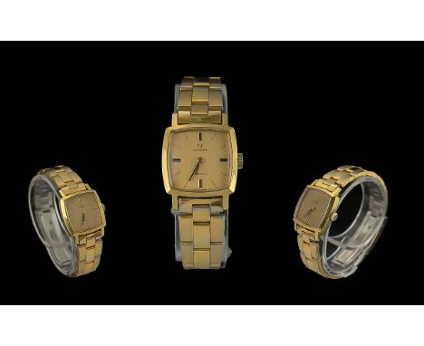 Omega - Geneve Ladies Gold on Steel Mechanical Wrist Watch. c.1970's. Features Champagne Dial and Gold Markers.