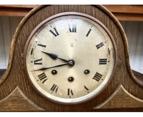 Wooden Napoleon Style Mantle Clock, twisted supports, white face, Roman numerals, measures 10'' high x 17'' wide. Together wi