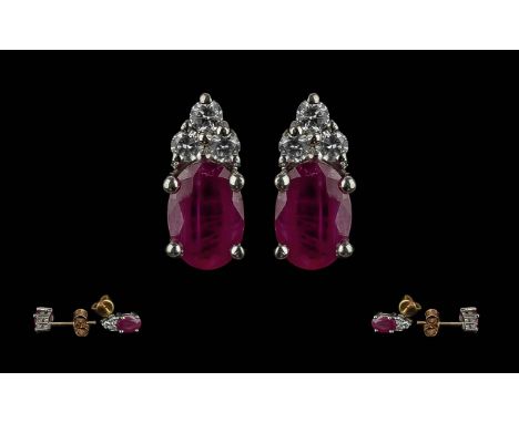 Ladies 9ct Ruby Set Earrings. Fully Hallmarked for 9ct.