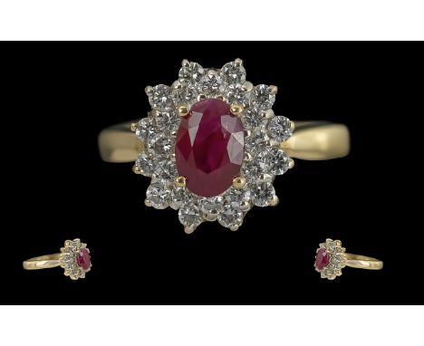 Ladies 14ct Gold Diamond and Ruby Set Cluster Ring, The Central Oval Shaped Ruby of Excellent Colour / Clarity, Surrounded by
