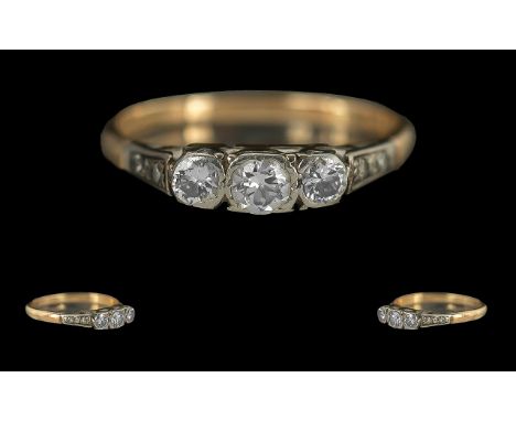 Ladies 18ct Gold 3 Stone Diamond Set Ring, Marked 18ct to Interior of Shank. The 3 Round Brilliant Cut Diamonds of Good Colou