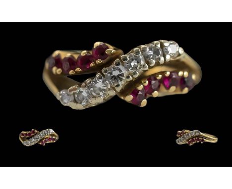 14ct Gold Ruby &amp; Diamond Dress Ring - Stamped 14K To Interior Of Shank. Set On A Twist 7 Small Diamonds with 4 Rubies On 