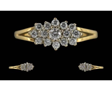 Ladies 18ct Gold Pleasing Diamond Set Cluster Ring, Full Hallmark to Interior of Shank. The Well Matched Diamonds of Good Col