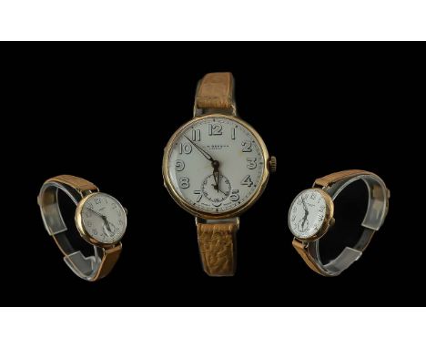 J.W. Benson Officers 9ct Gold Cased Mechanical Trench Watch - Full Hallmark To Interior Of Case. Circa 1920's With White Dial
