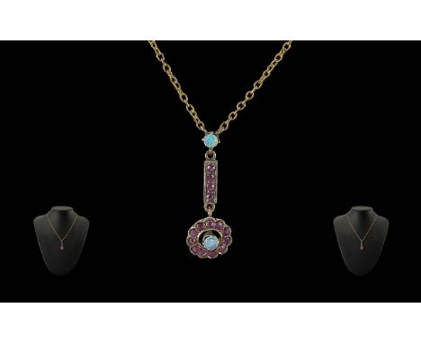 Antique Period 9ct Gold Opal &amp; Garnet Set Pendant &amp; Chain marked 9ct.  Garnets of pale colour and well matched. Lengt