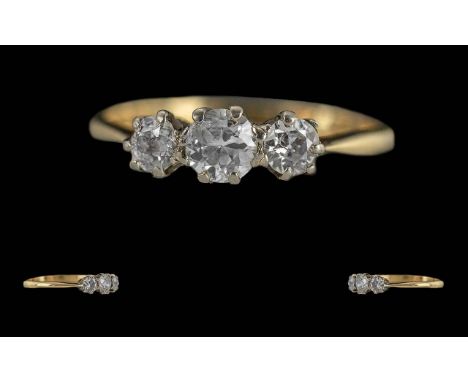 Ladies 18ct Gold Attractive 3 Stone Diamond Set Ring. c.1920's. Marked 18ct to Interior of Shank. The Trio of Well Matched Ro