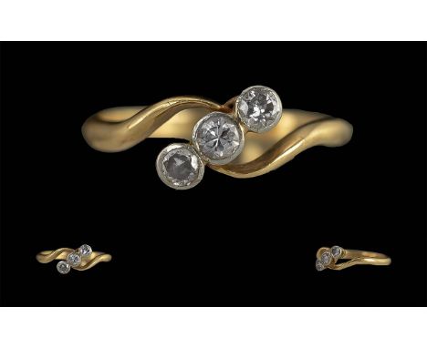 18ct Gold Three Stone Diamond Crossover Ring, weight 2.78 grams. Ring size N/O.