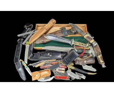 Box Containing a Quantity of Daggers &amp; Knives, to include Victorinox Swiss Army Officer's Knife, original Puma German kni