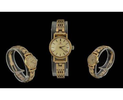 Omega Ladies Gold Plated Mechanical Wrist Watch. c.1960's. Features Champagne Dial, Gold Markers, Gold Tone Bracelet.