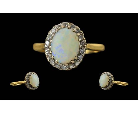 Antique Period Attractive 18ct Gold Opal and Diamond Set Cluster Ring. Marked 18ct to Interior of Shank. The Central Opal Sur